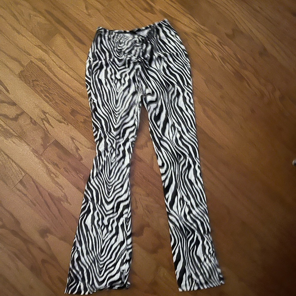 zebra flare pants with cross strings
